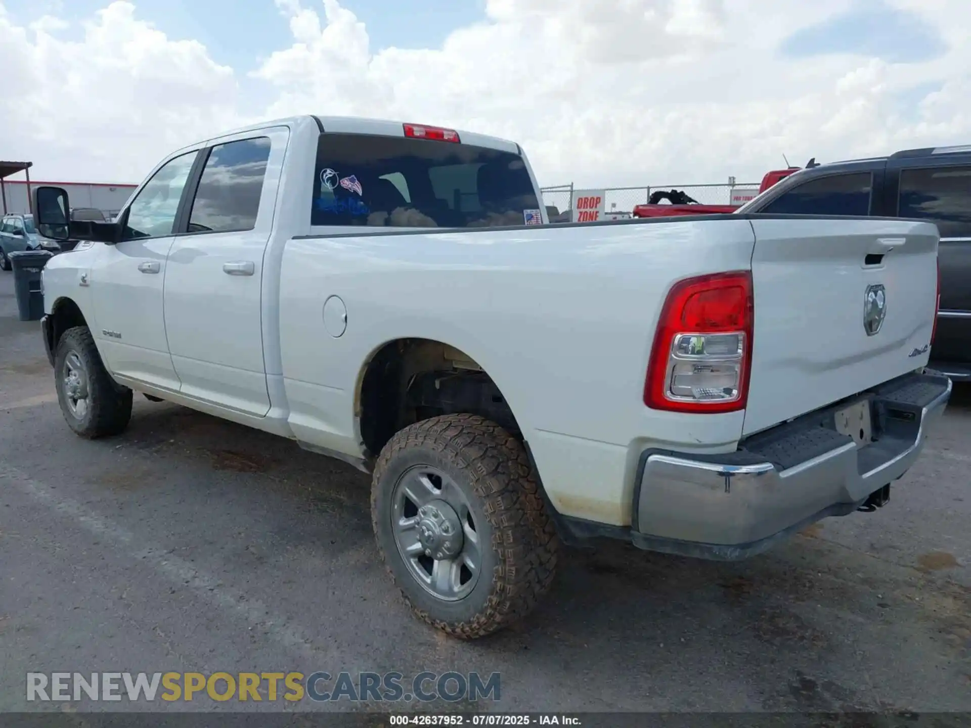 3 Photograph of a damaged car 3C6UR5DL8NG365559 RAM 2500 2022
