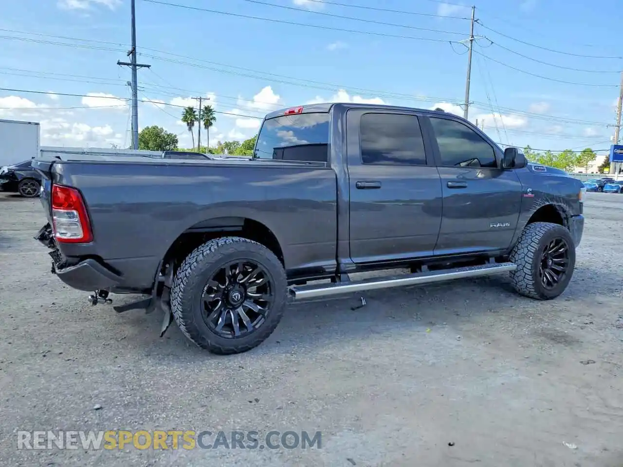 3 Photograph of a damaged car 3C6UR5DLXNG124117 RAM 2500 2022
