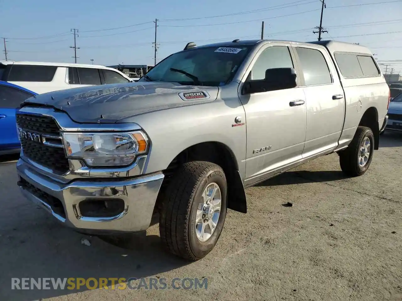 1 Photograph of a damaged car 3C6UR5DLXNG254768 RAM 2500 2022