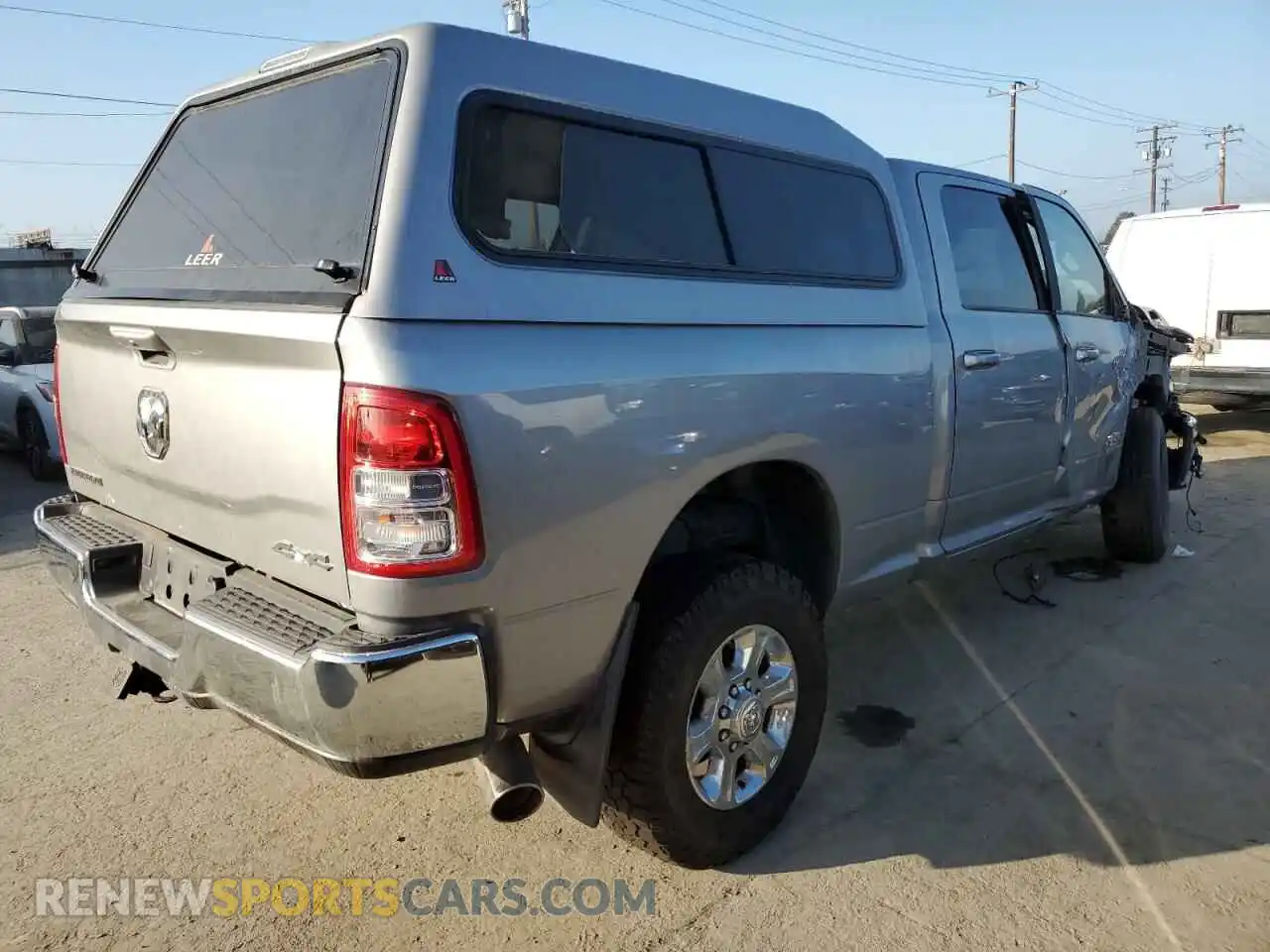 3 Photograph of a damaged car 3C6UR5DLXNG254768 RAM 2500 2022