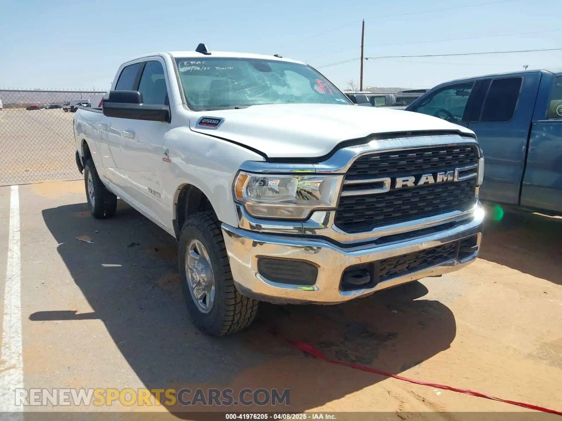 1 Photograph of a damaged car 3C6UR5DLXNG321501 RAM 2500 2022
