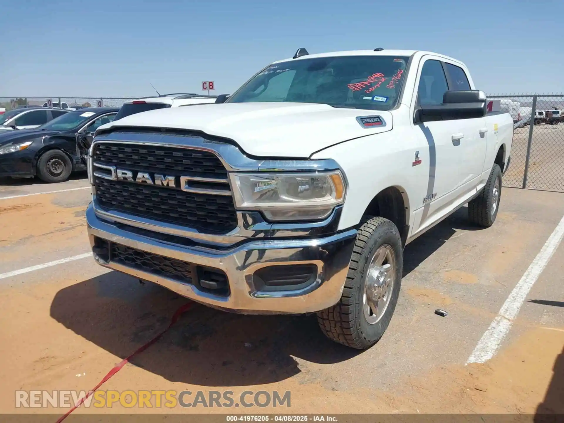 2 Photograph of a damaged car 3C6UR5DLXNG321501 RAM 2500 2022