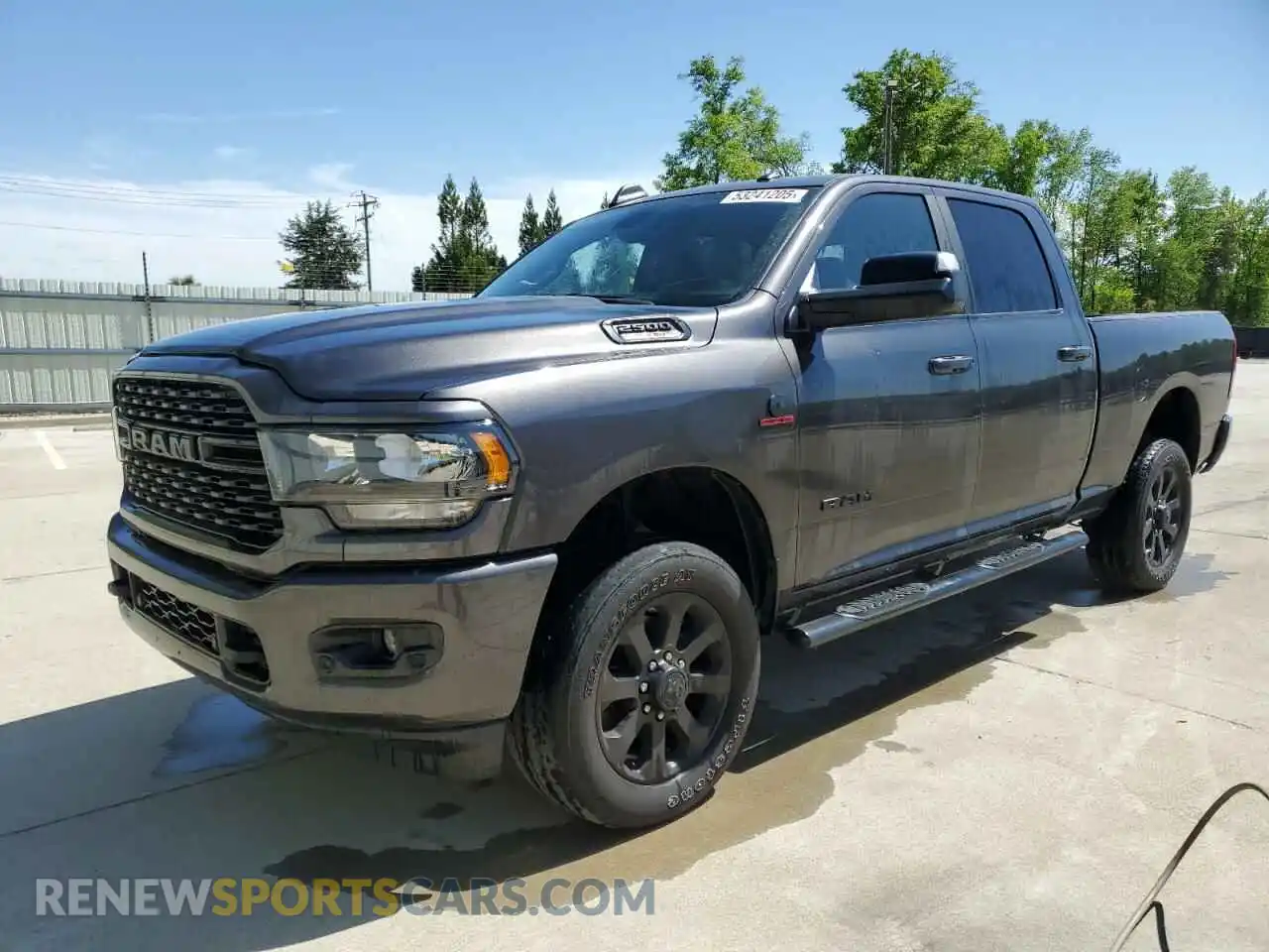 1 Photograph of a damaged car 3C6UR5DLXNG373551 RAM 2500 2022