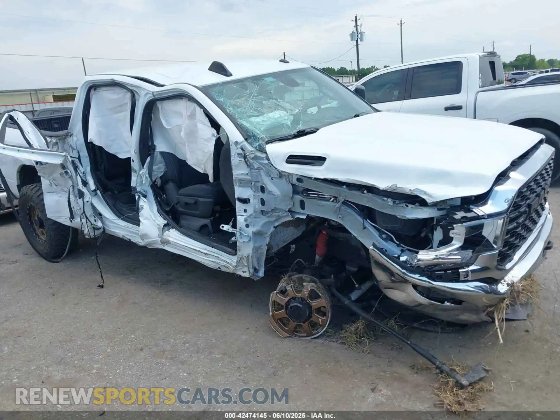1 Photograph of a damaged car 3C6UR5DLXNG436311 RAM 2500 2022