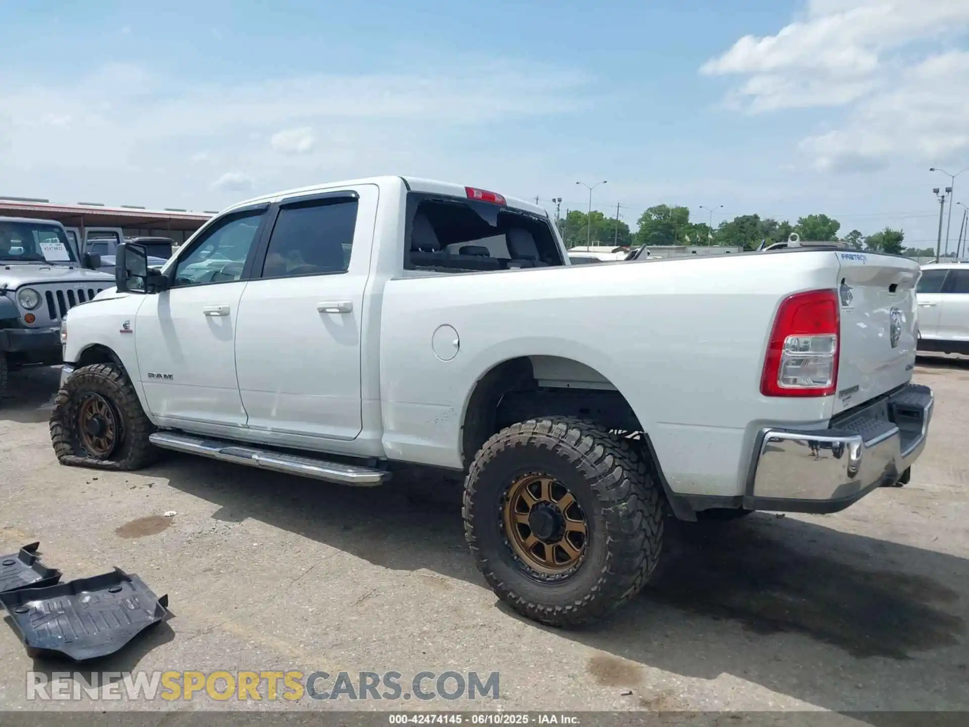 3 Photograph of a damaged car 3C6UR5DLXNG436311 RAM 2500 2022