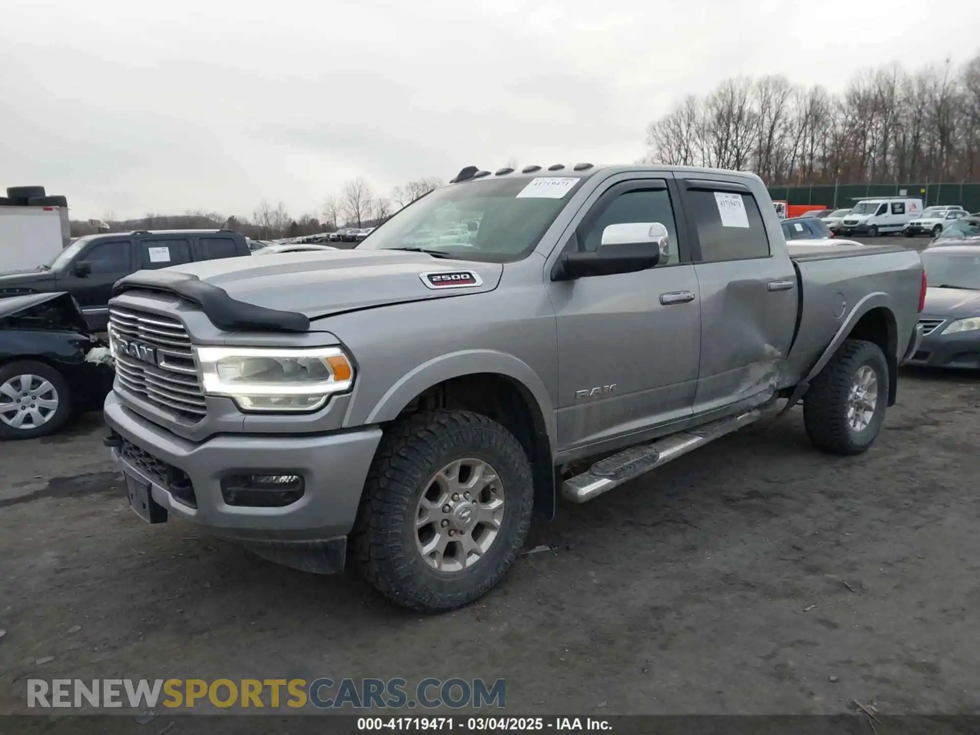 2 Photograph of a damaged car 3C6UR5FJ1NG230435 RAM 2500 2022