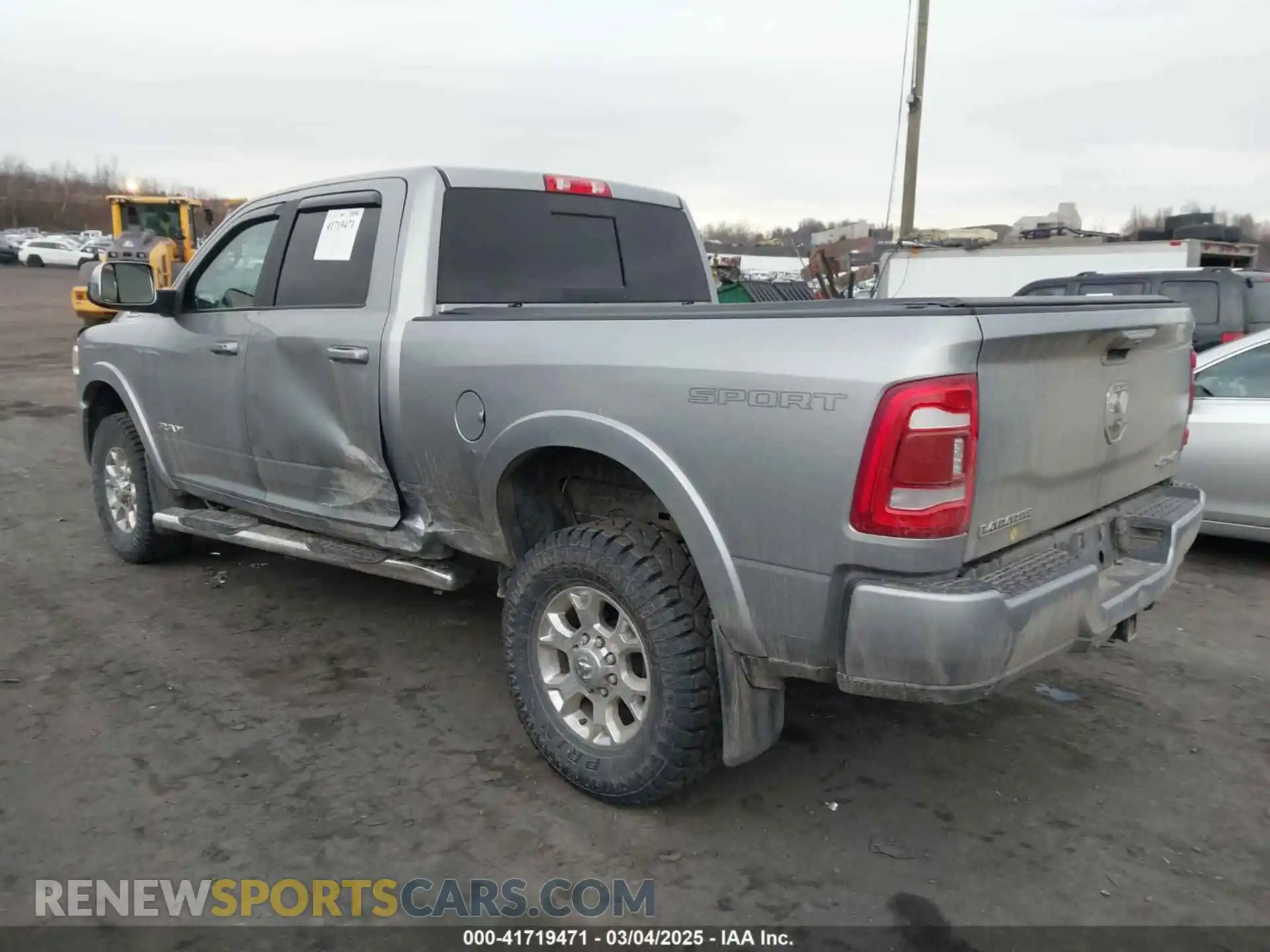 3 Photograph of a damaged car 3C6UR5FJ1NG230435 RAM 2500 2022