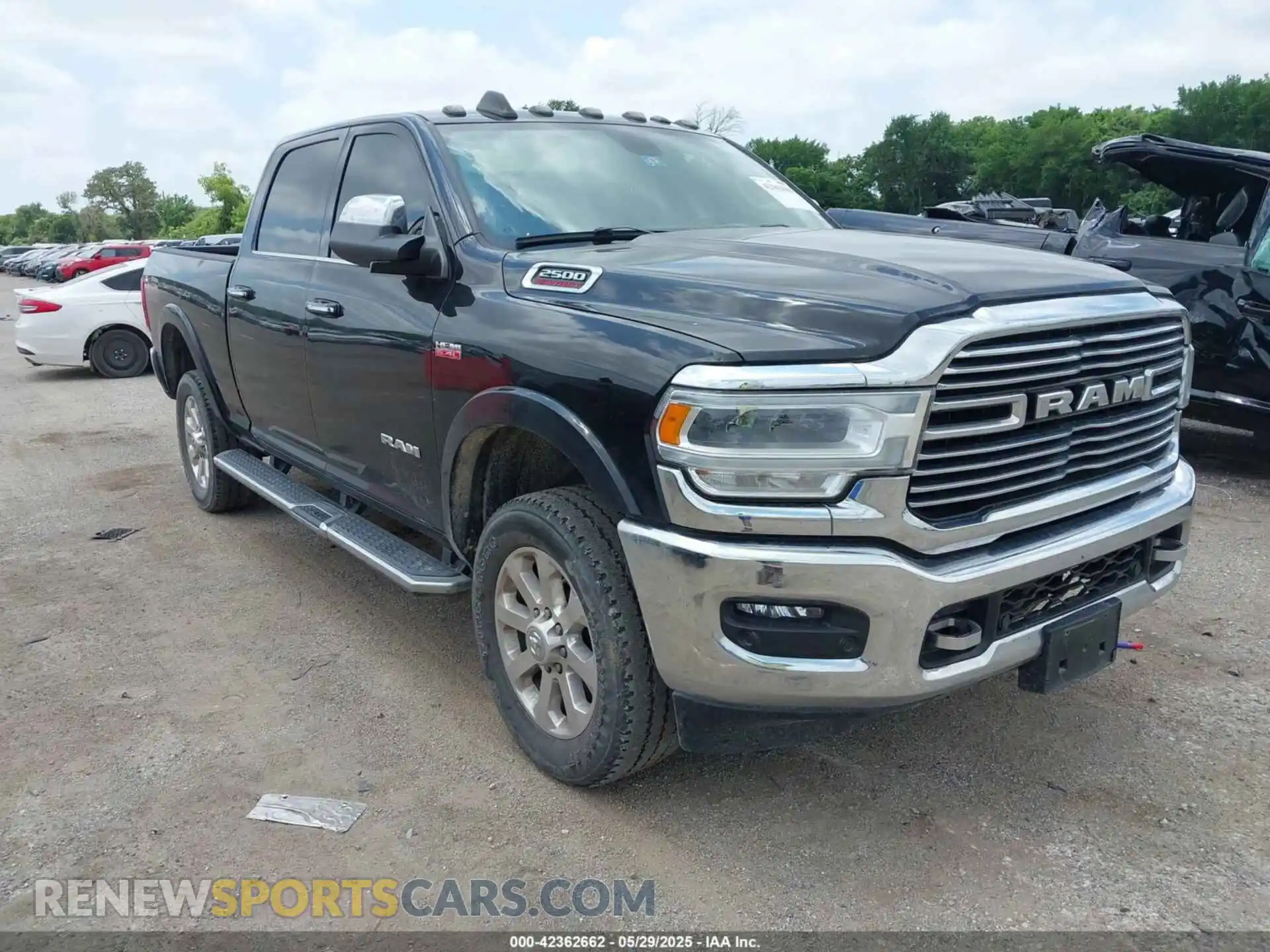 1 Photograph of a damaged car 3C6UR5FJ2NG305658 RAM 2500 2022