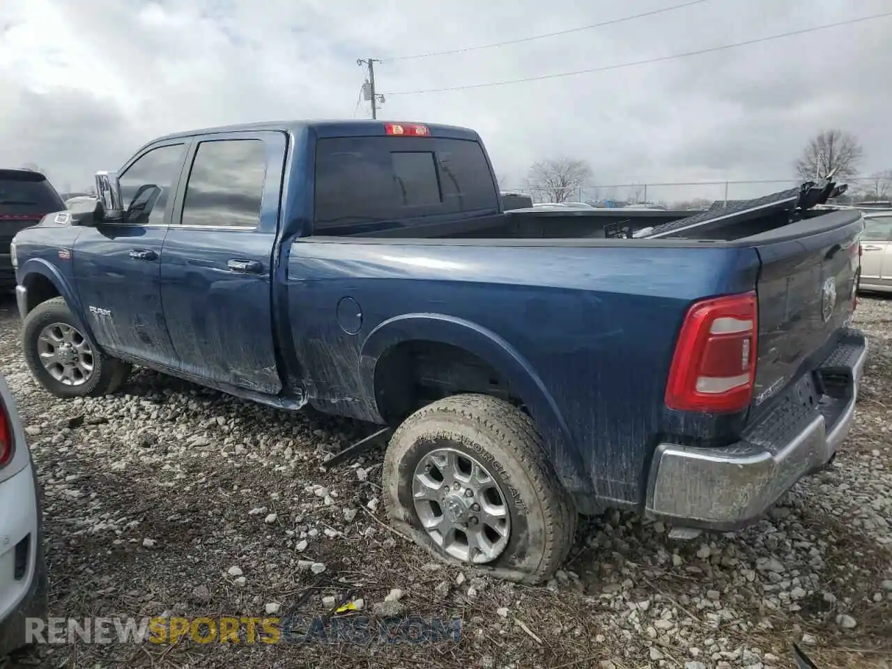 2 Photograph of a damaged car 3C6UR5FJ4NG318444 RAM 2500 2022