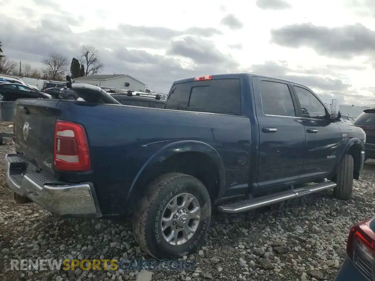 3 Photograph of a damaged car 3C6UR5FJ4NG318444 RAM 2500 2022
