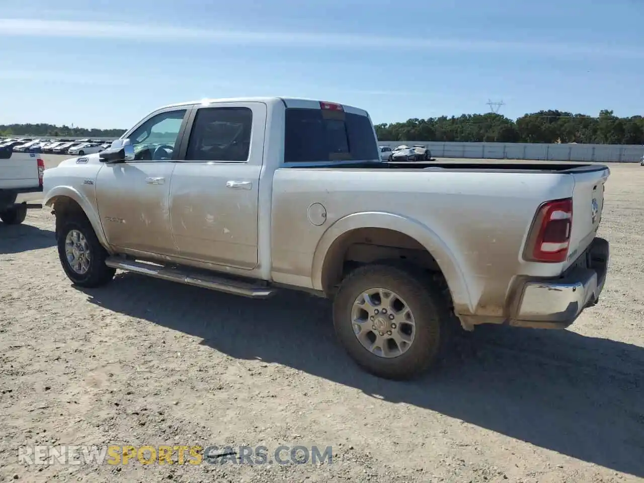 2 Photograph of a damaged car 3C6UR5FJ5NG386879 RAM 2500 2022
