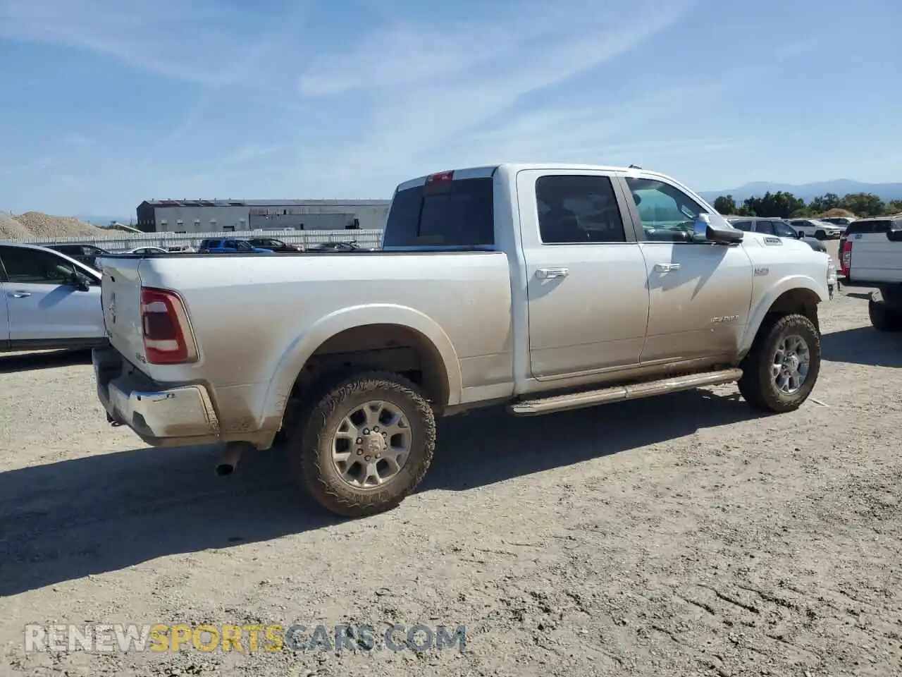 3 Photograph of a damaged car 3C6UR5FJ5NG386879 RAM 2500 2022