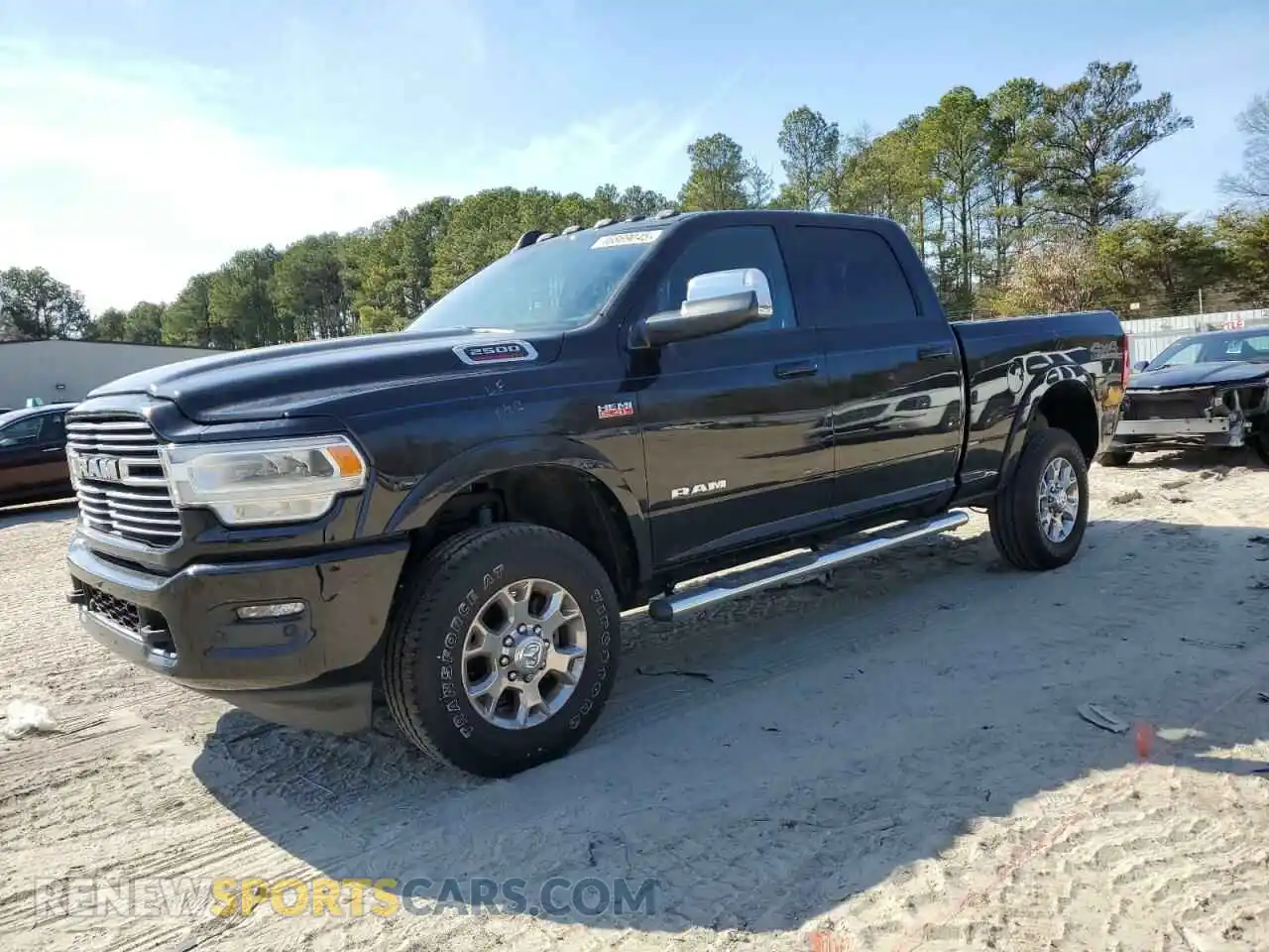 1 Photograph of a damaged car 3C6UR5FJ7NG383885 RAM 2500 2022