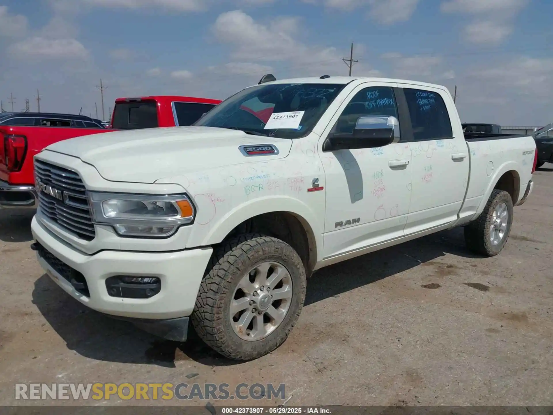 2 Photograph of a damaged car 3C6UR5FL0NG143918 RAM 2500 2022