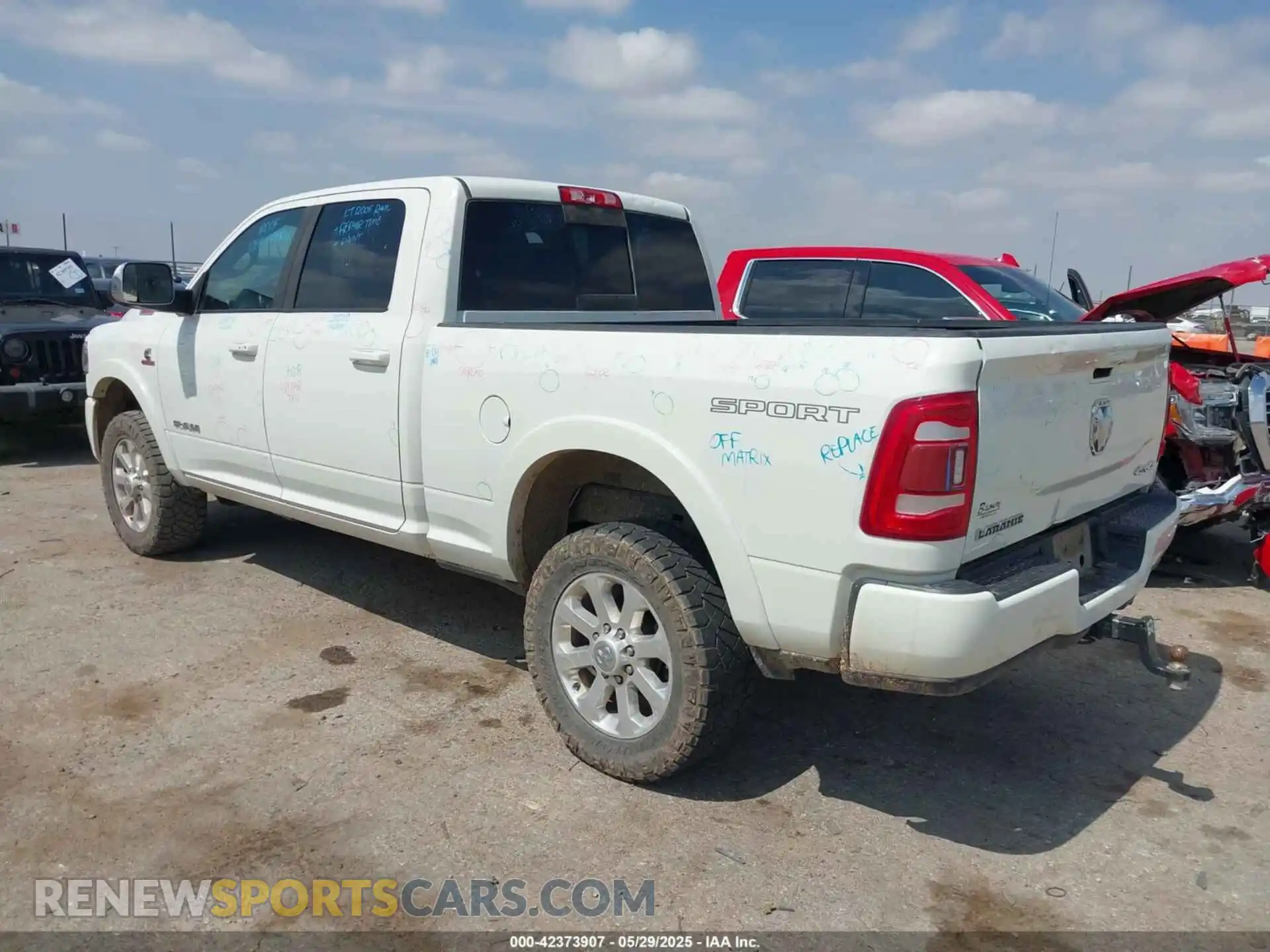 3 Photograph of a damaged car 3C6UR5FL0NG143918 RAM 2500 2022