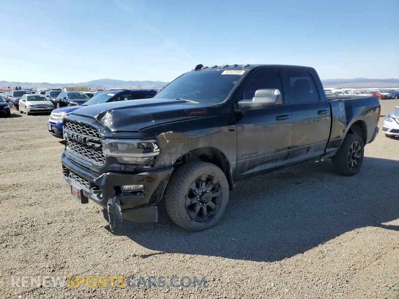 1 Photograph of a damaged car 3C6UR5FL1NG335574 RAM 2500 2022