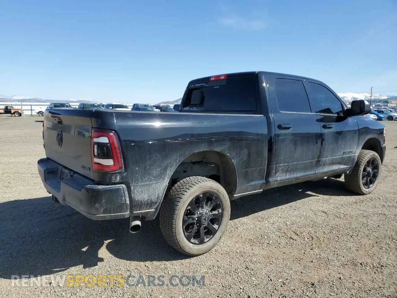3 Photograph of a damaged car 3C6UR5FL1NG335574 RAM 2500 2022