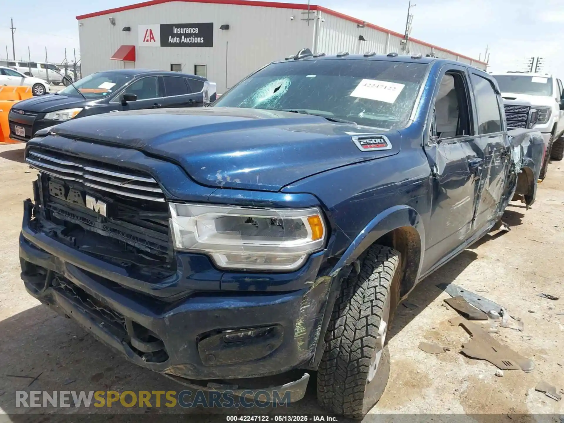 2 Photograph of a damaged car 3C6UR5FL1NG372673 RAM 2500 2022
