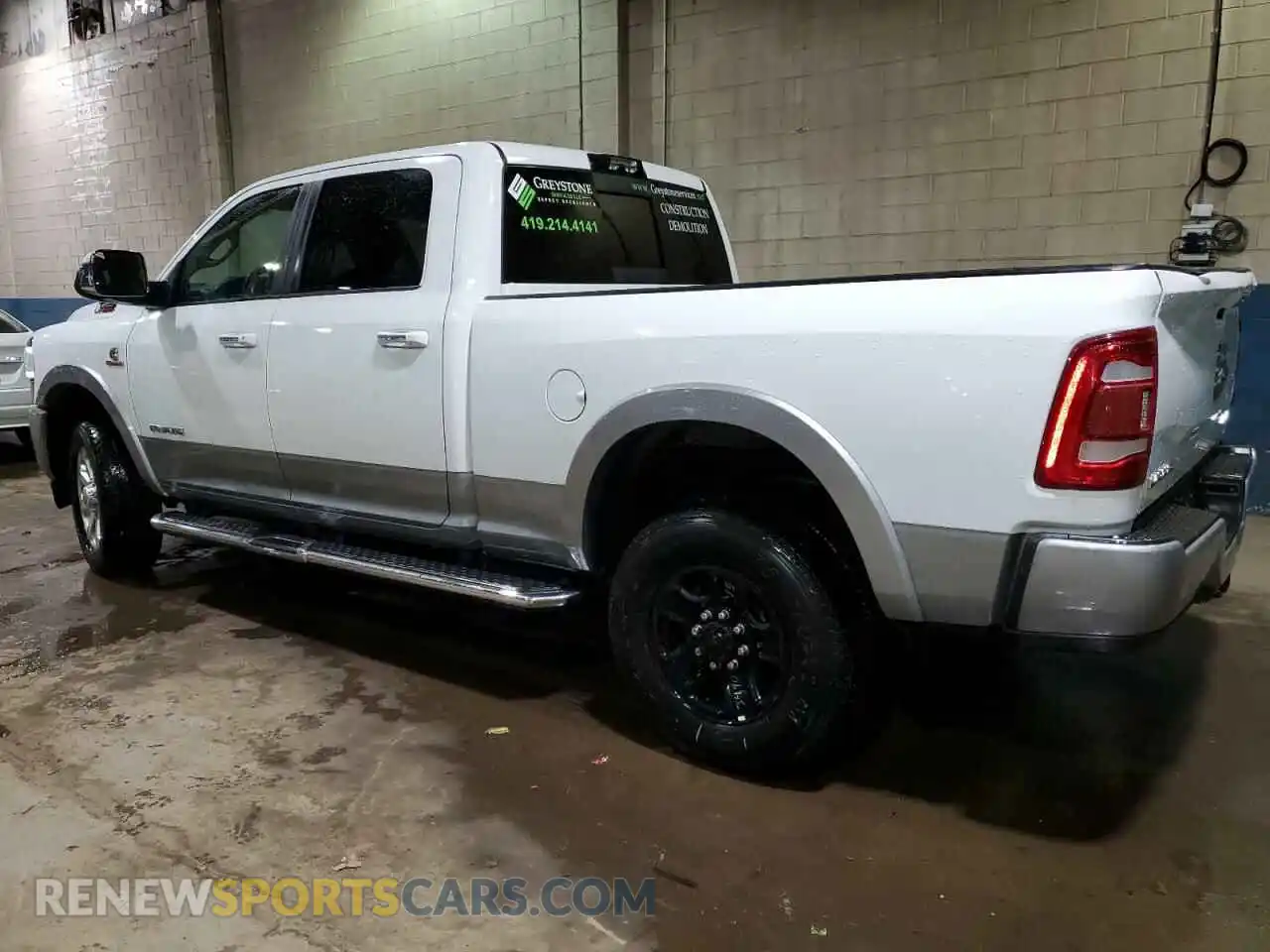 2 Photograph of a damaged car 3C6UR5FL4NG220760 RAM 2500 2022