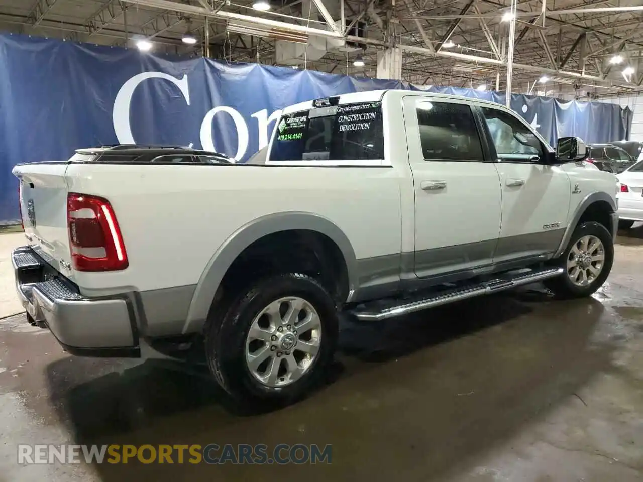 3 Photograph of a damaged car 3C6UR5FL4NG220760 RAM 2500 2022