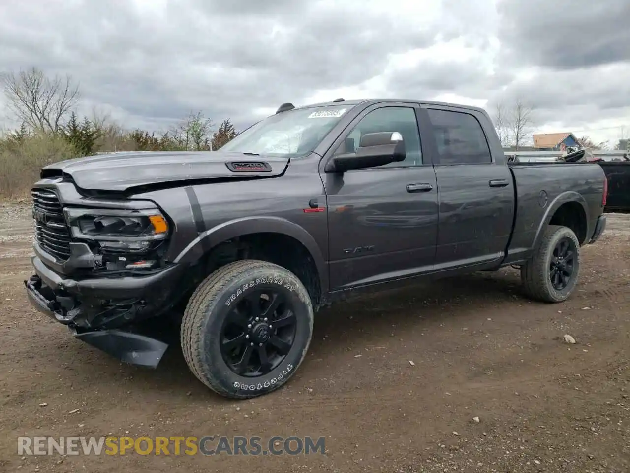 1 Photograph of a damaged car 3C6UR5FL5NG282071 RAM 2500 2022