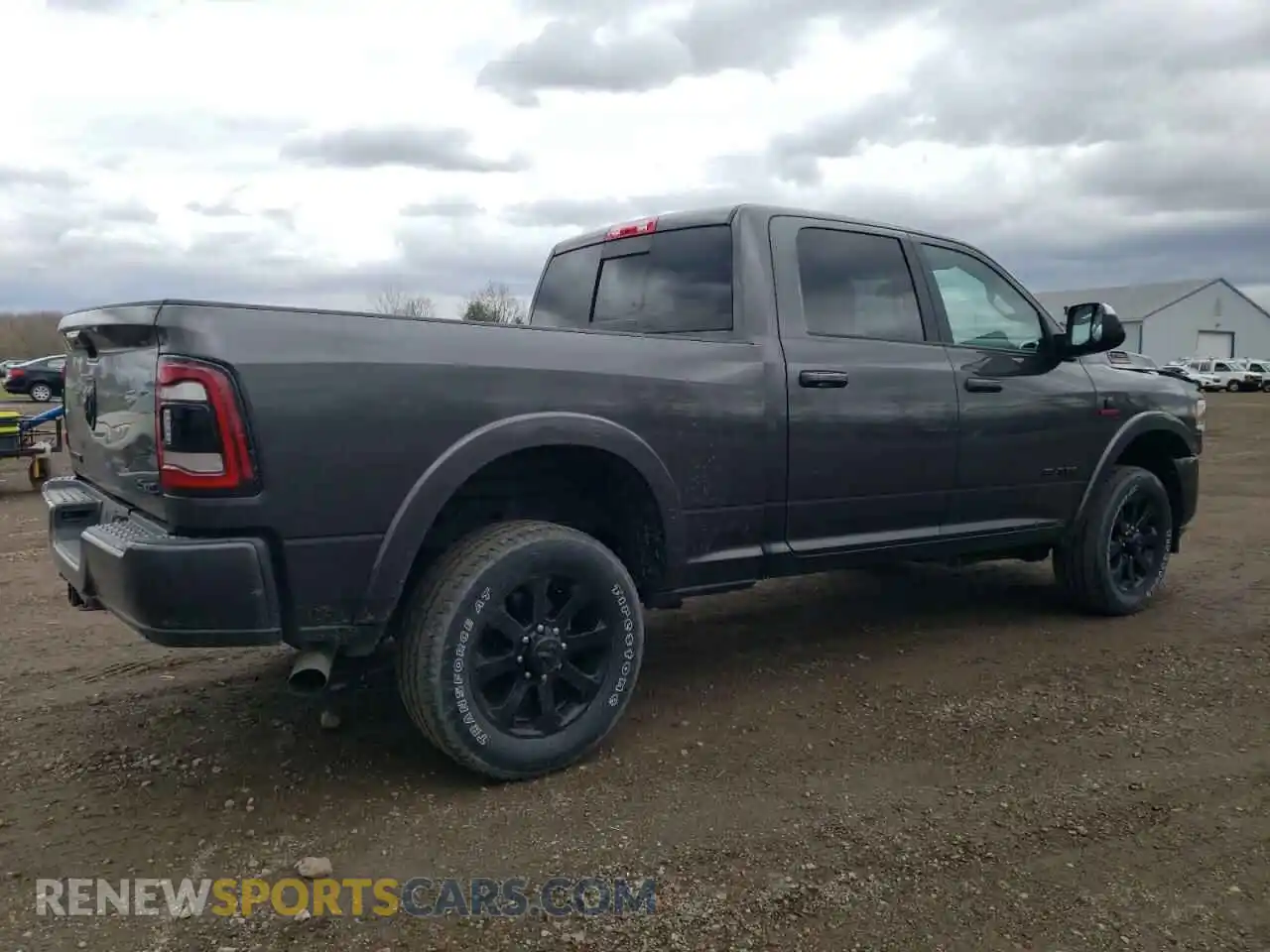 3 Photograph of a damaged car 3C6UR5FL5NG282071 RAM 2500 2022