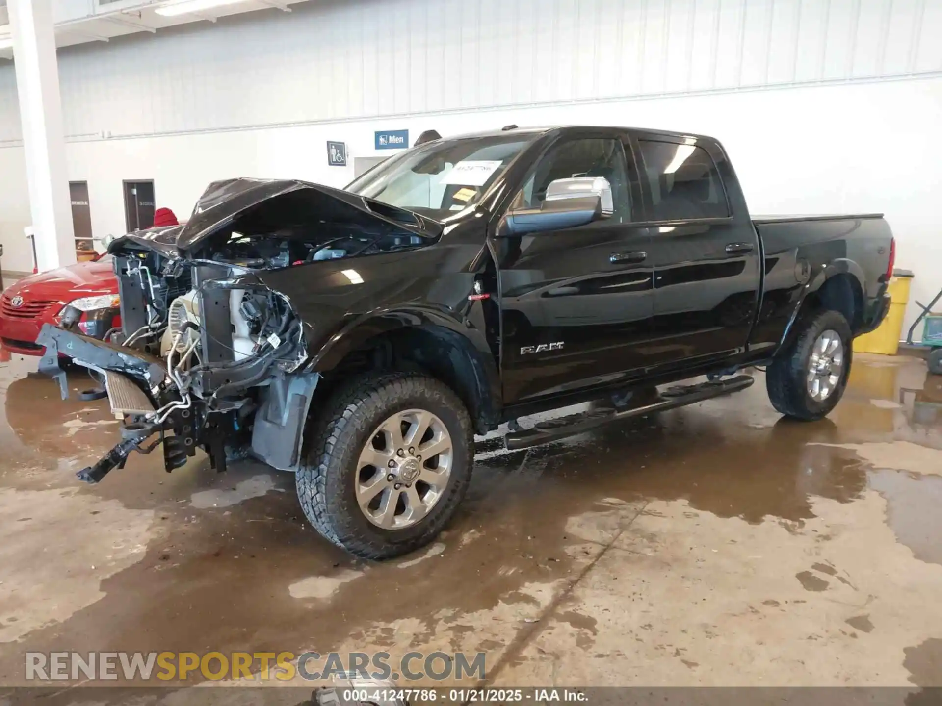 2 Photograph of a damaged car 3C6UR5FL6NG368022 RAM 2500 2022