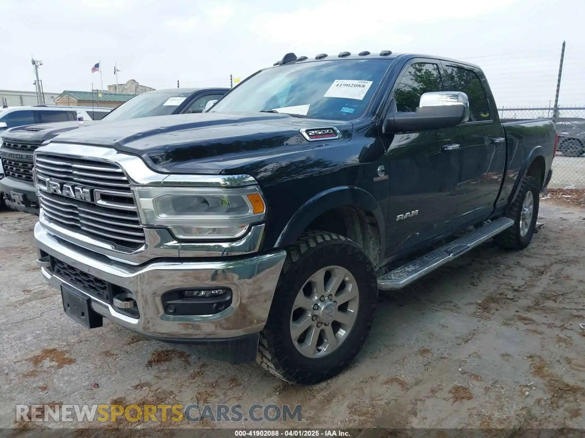2 Photograph of a damaged car 3C6UR5FL7NG282895 RAM 2500 2022