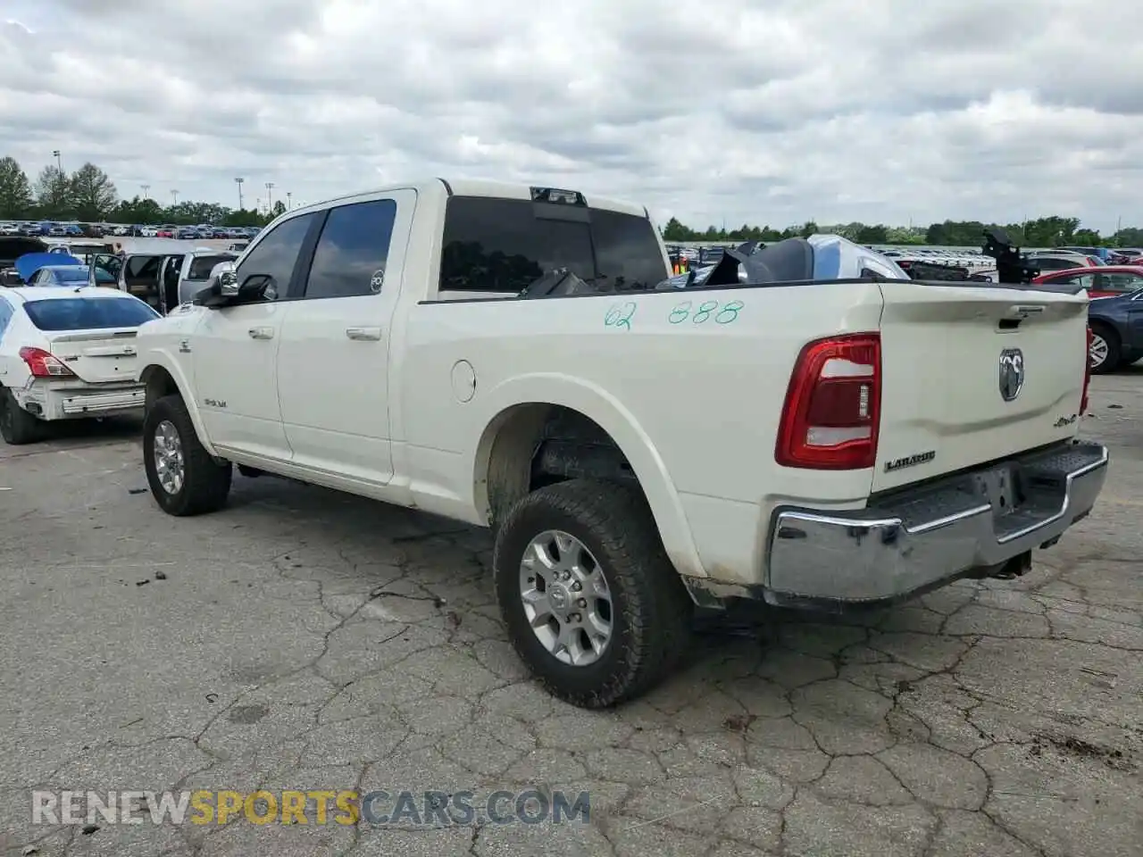 2 Photograph of a damaged car 3C6UR5FL8NG328556 RAM 2500 2022