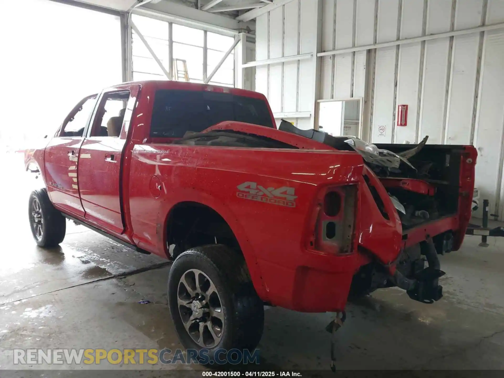 3 Photograph of a damaged car 3C6UR5GL2NG130702 RAM 2500 2022