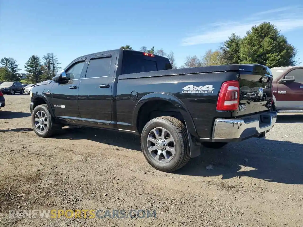2 Photograph of a damaged car 3C6UR5GL8NG283410 RAM 2500 2022