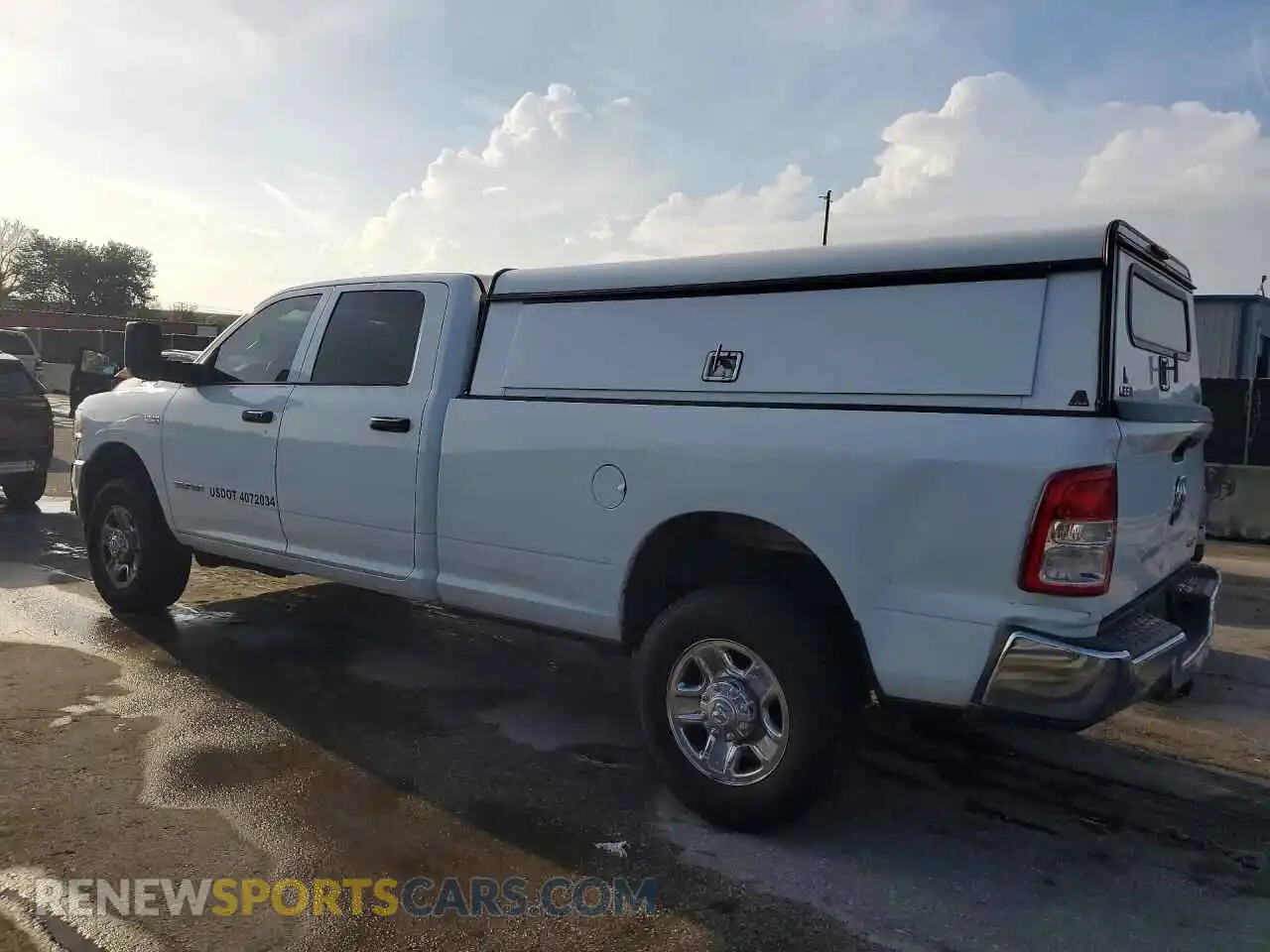 2 Photograph of a damaged car 3C6UR5HJ0NG365824 RAM 2500 2022