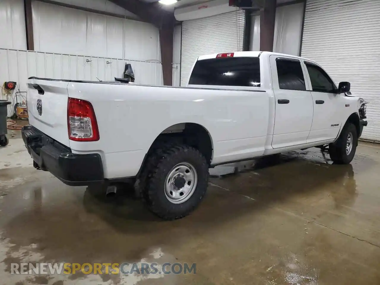 3 Photograph of a damaged car 3C6UR5HJ2NG202253 RAM 2500 2022