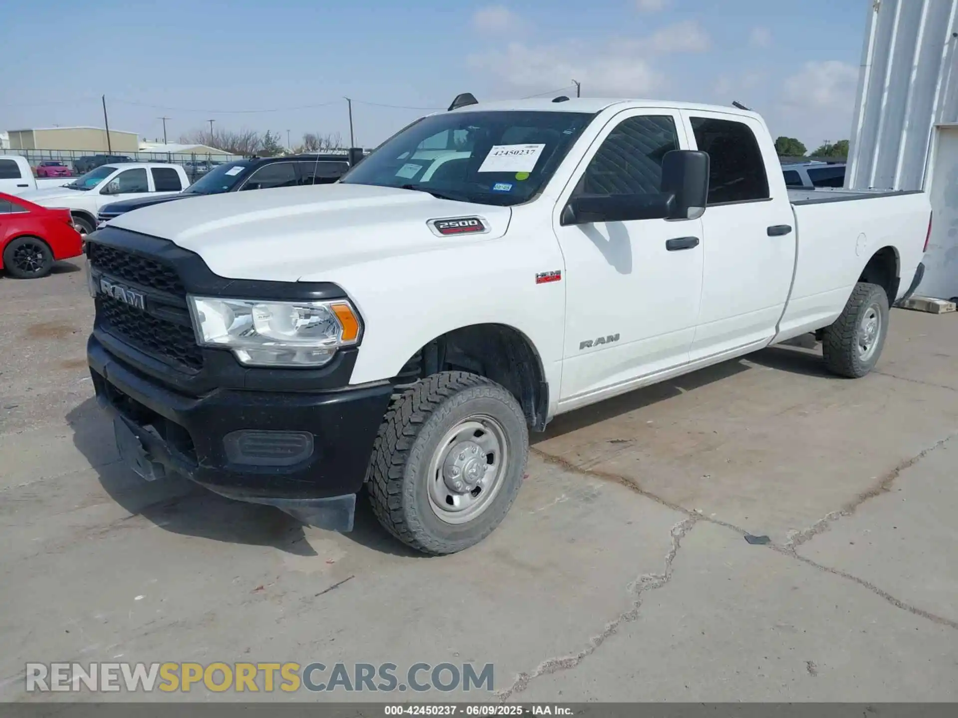 2 Photograph of a damaged car 3C6UR5HJ2NG202690 RAM 2500 2022