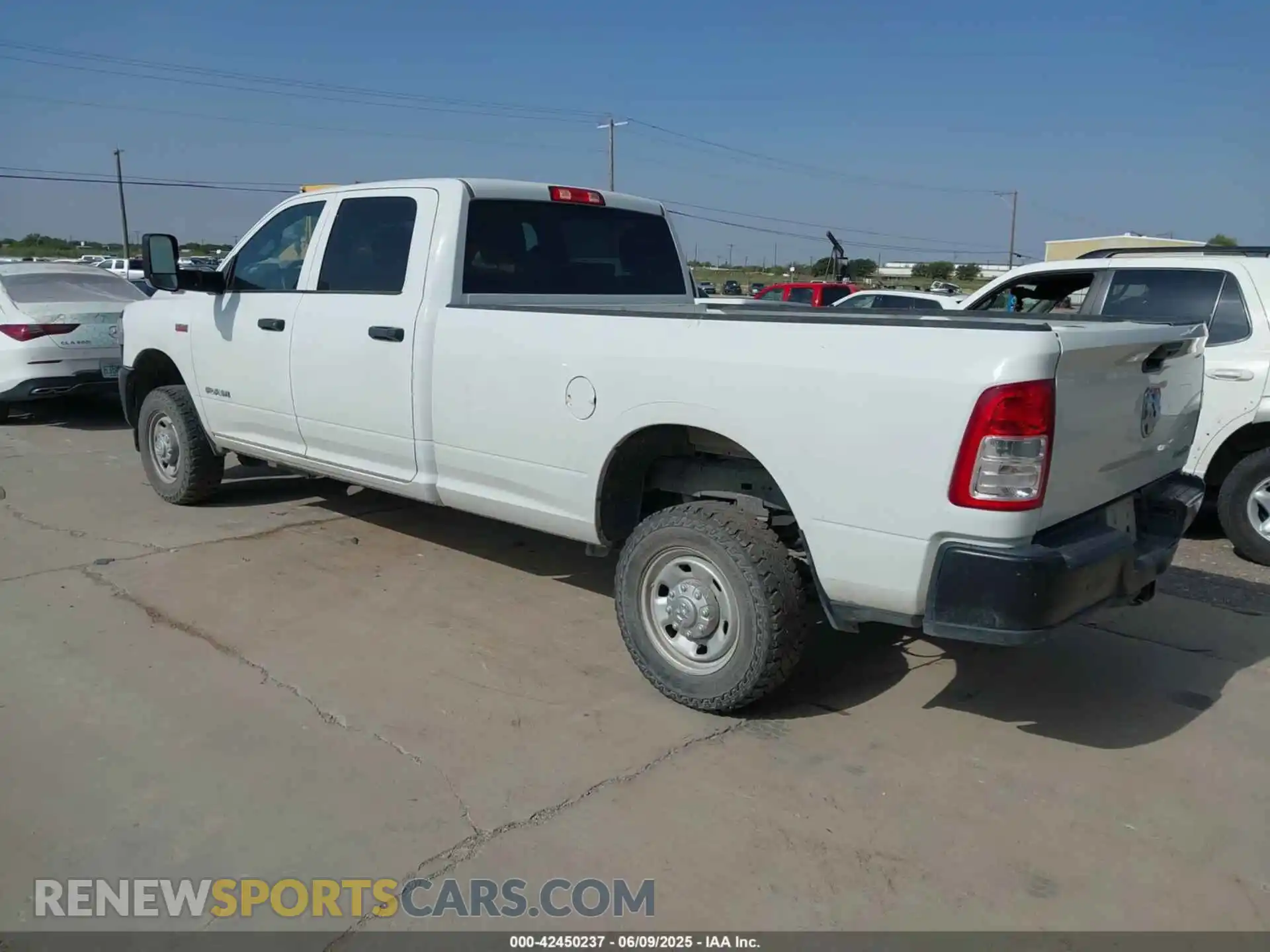 3 Photograph of a damaged car 3C6UR5HJ2NG202690 RAM 2500 2022
