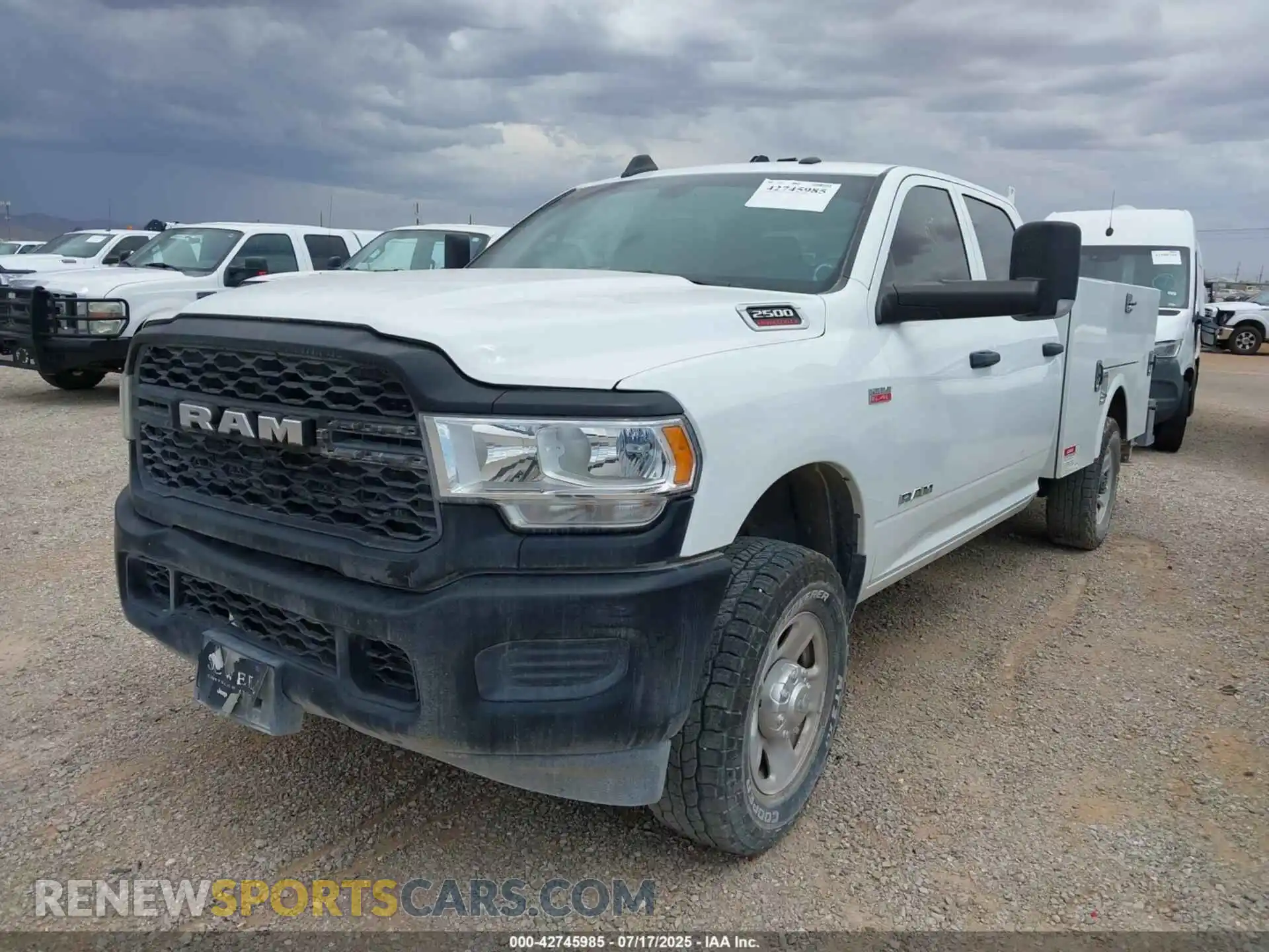 2 Photograph of a damaged car 3C6UR5HJ2NG366148 RAM 2500 2022