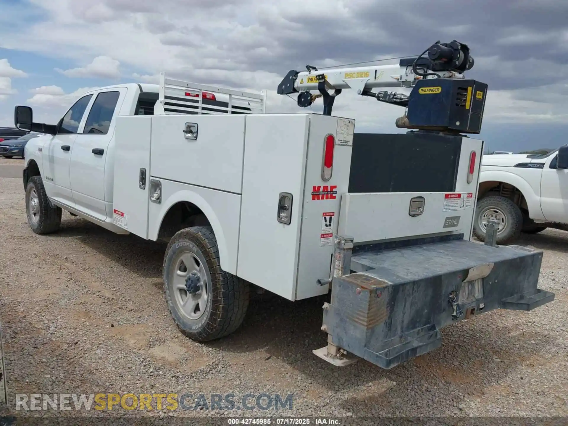 3 Photograph of a damaged car 3C6UR5HJ2NG366148 RAM 2500 2022