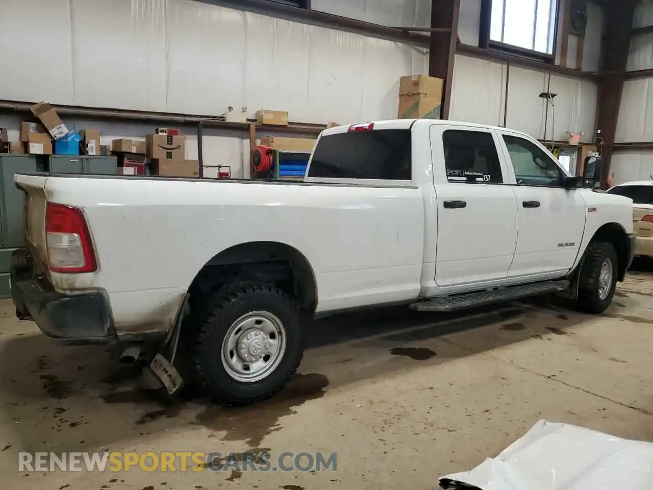 3 Photograph of a damaged car 3C6UR5HJ3NG365610 RAM 2500 2022