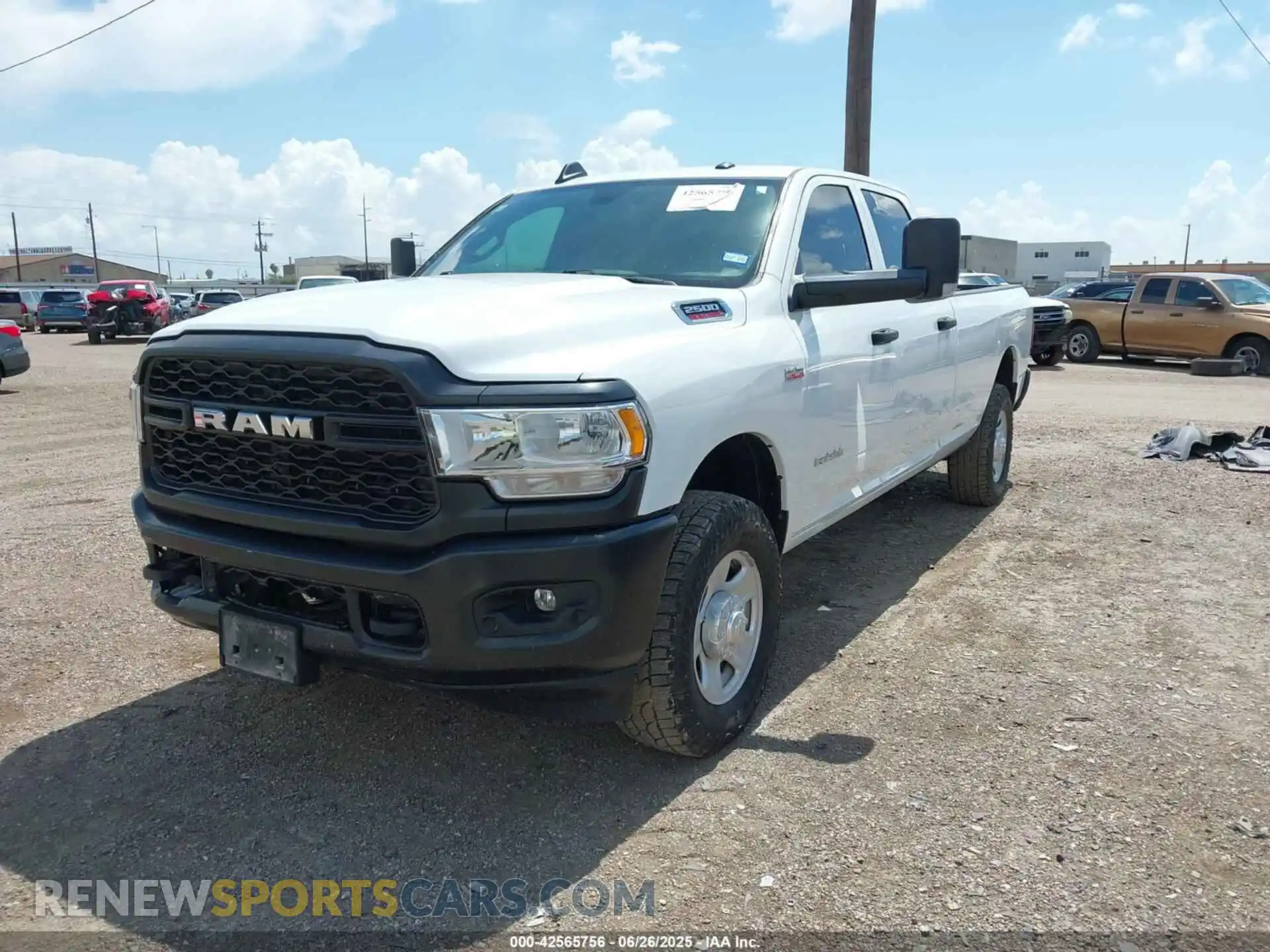 2 Photograph of a damaged car 3C6UR5HJ4NG345415 RAM 2500 2022