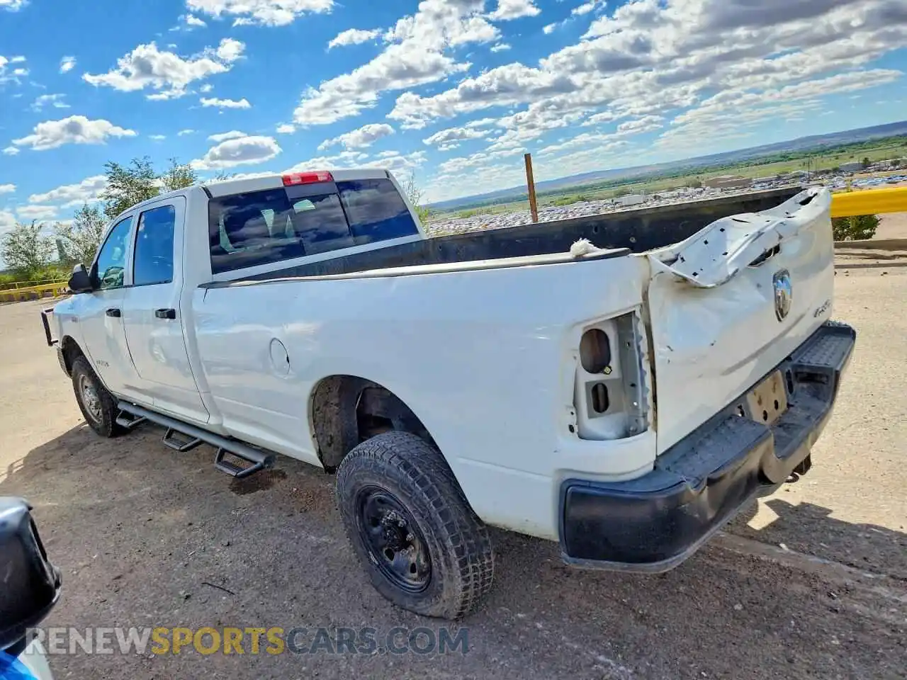 2 Photograph of a damaged car 3C6UR5HJ5NG273057 RAM 2500 2022