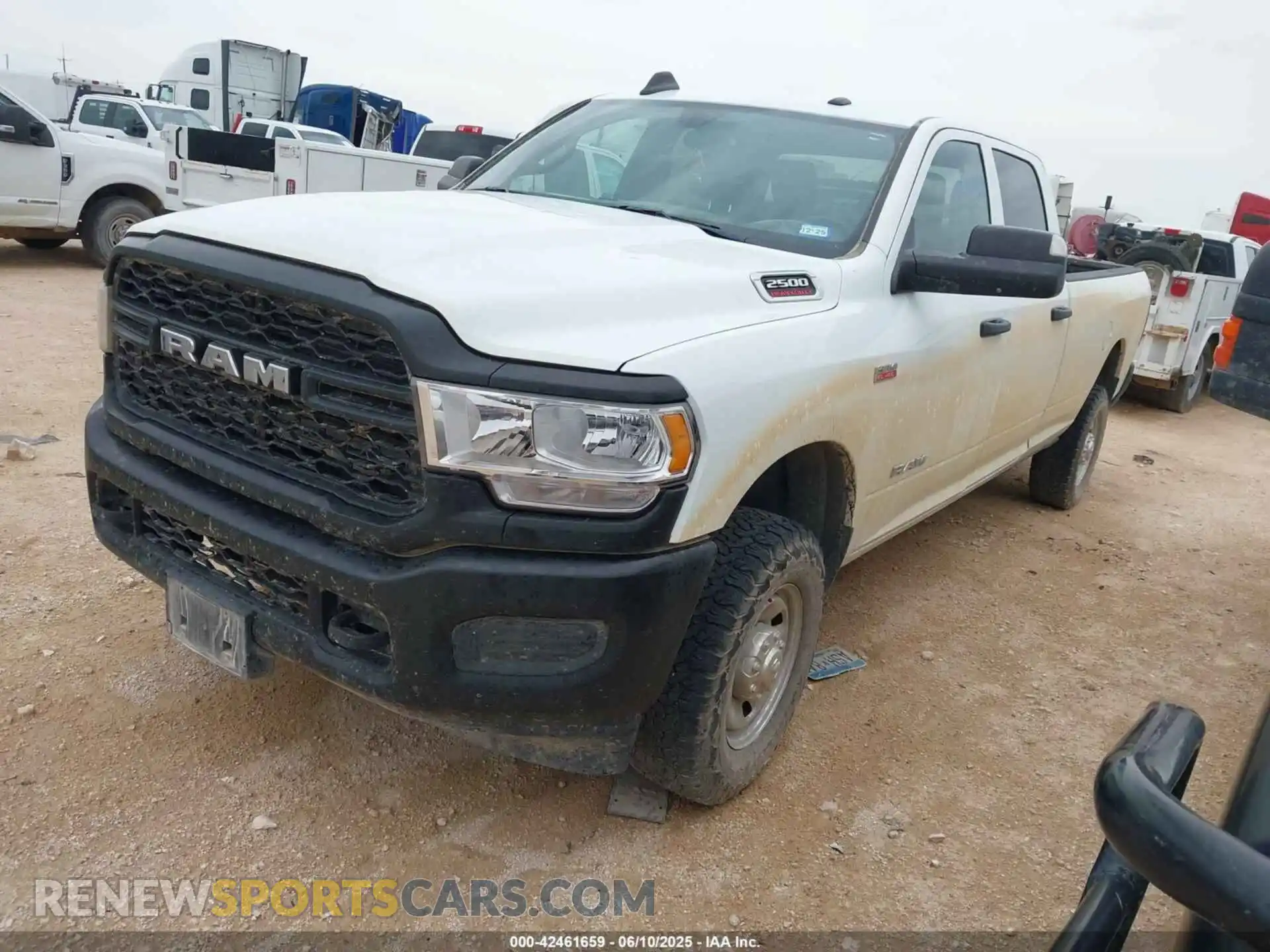 2 Photograph of a damaged car 3C6UR5HJ7NG357784 RAM 2500 2022