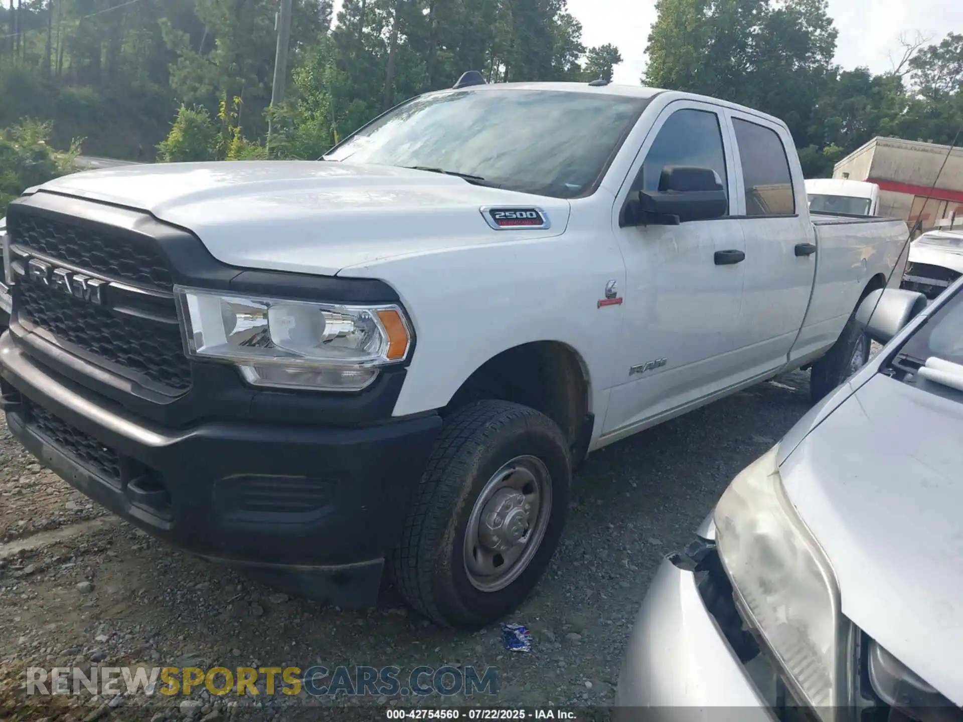 2 Photograph of a damaged car 3C6UR5HL2NG322815 RAM 2500 2022