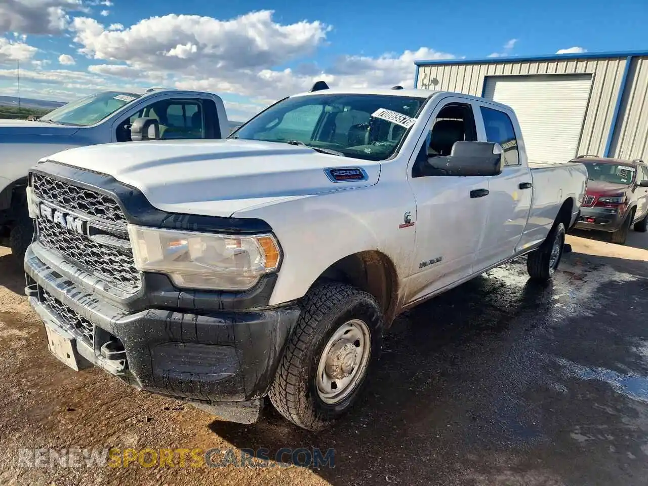 1 Photograph of a damaged car 3C6UR5HL5NG273352 RAM 2500 2022