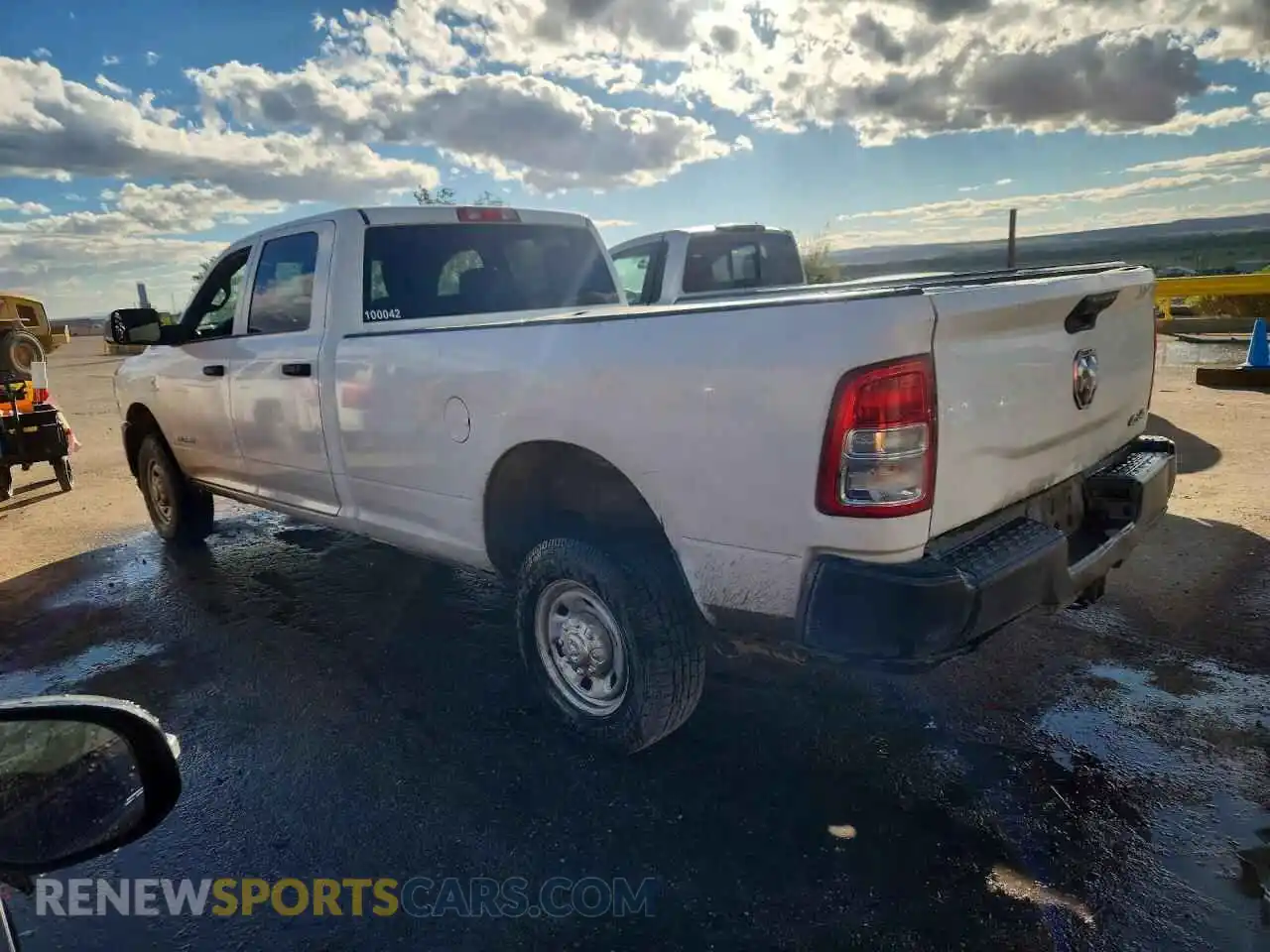 2 Photograph of a damaged car 3C6UR5HL5NG273352 RAM 2500 2022