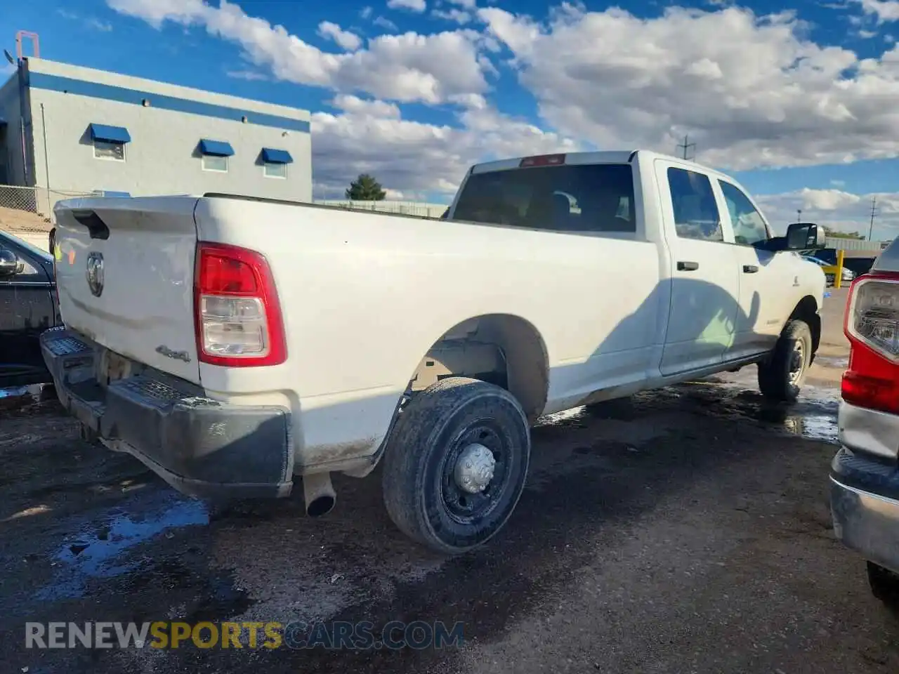 3 Photograph of a damaged car 3C6UR5HL5NG273352 RAM 2500 2022