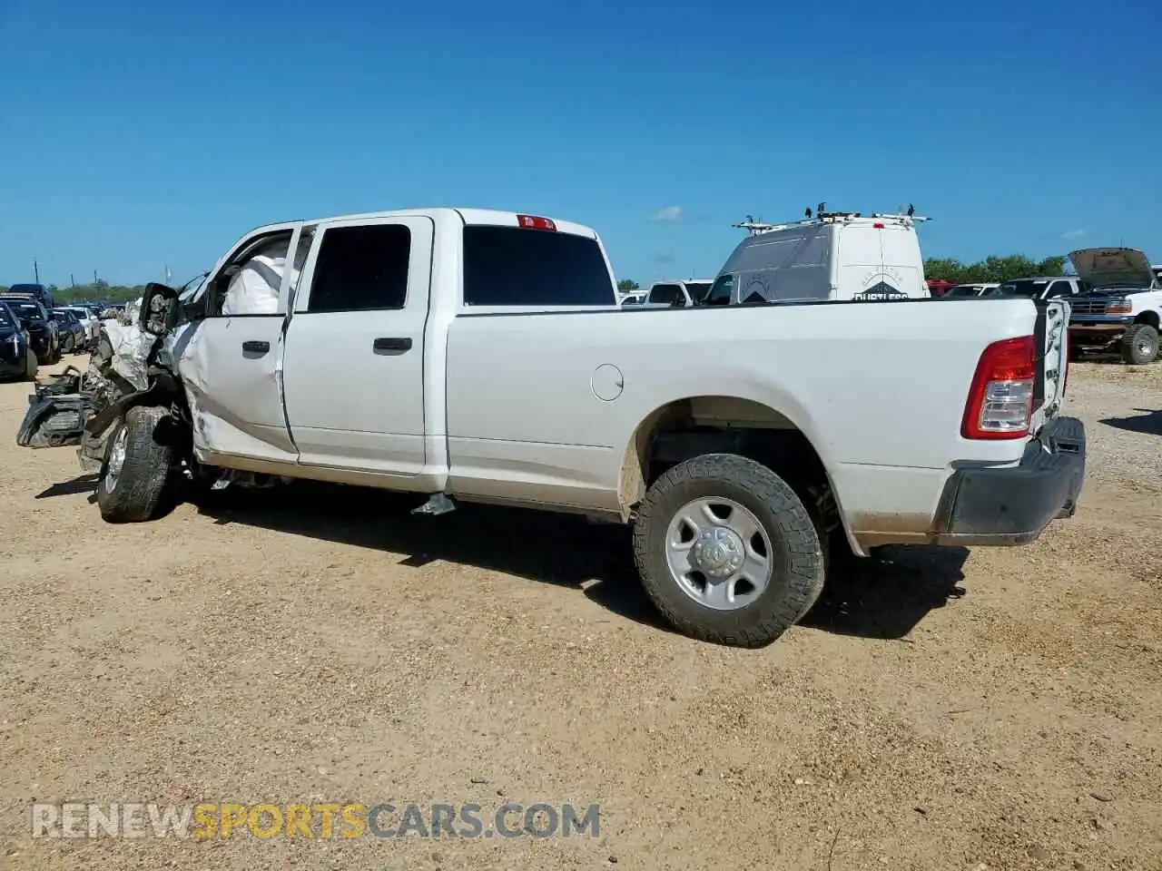 2 Photograph of a damaged car 3C6UR5HL5NG322971 RAM 2500 2022
