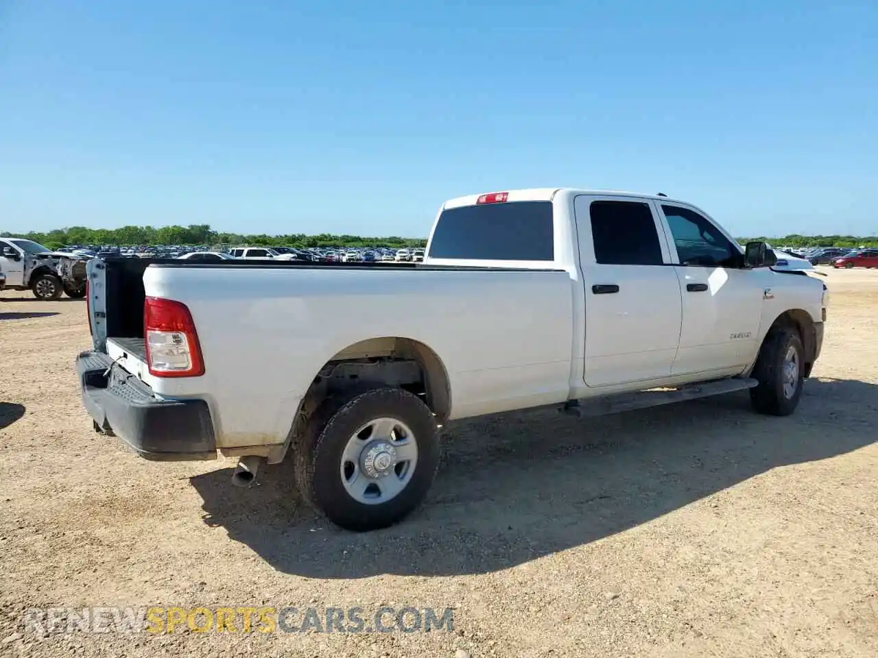 3 Photograph of a damaged car 3C6UR5HL5NG322971 RAM 2500 2022