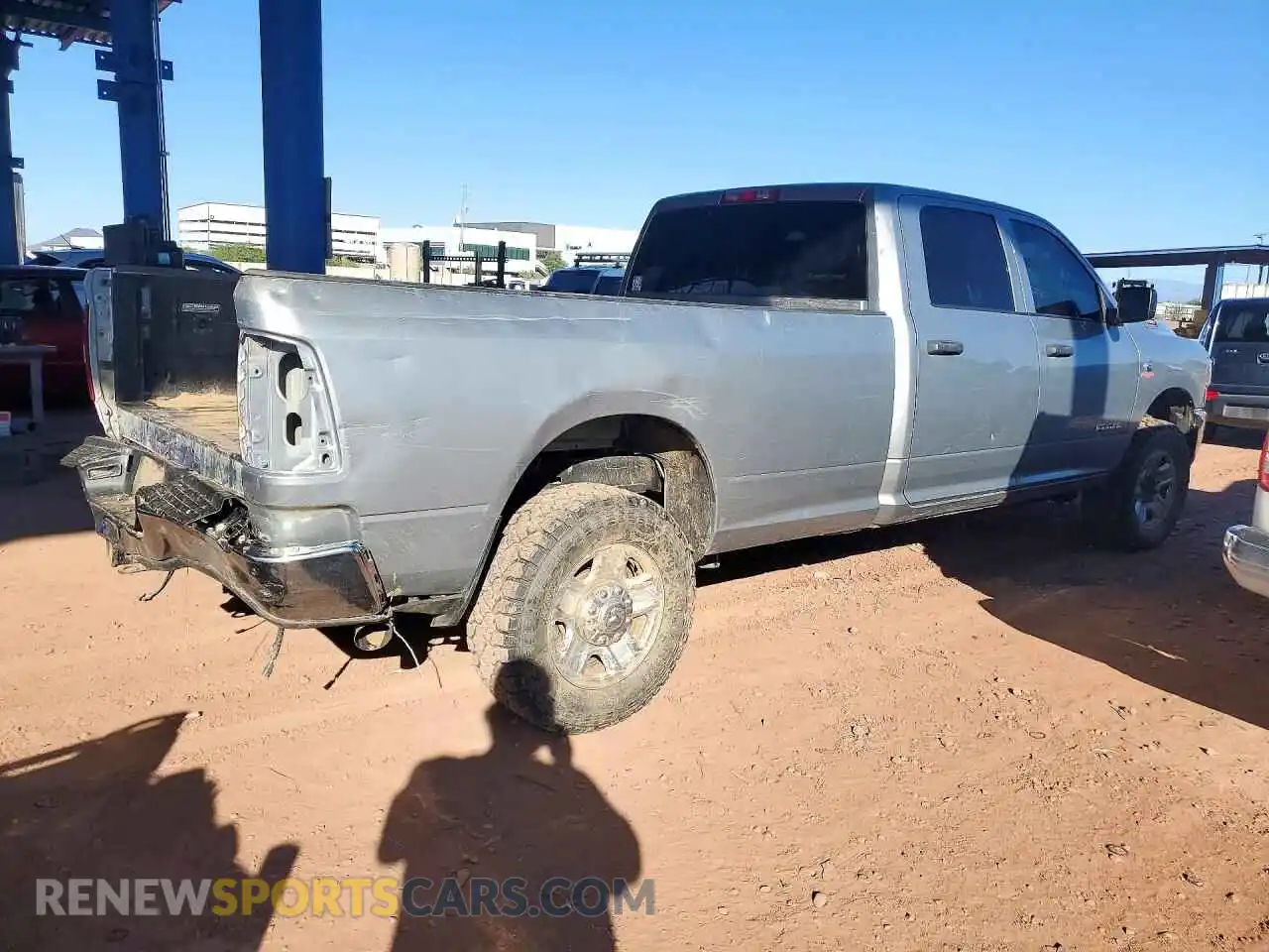 3 Photograph of a damaged car 3C6UR5HL9NG221075 RAM 2500 2022