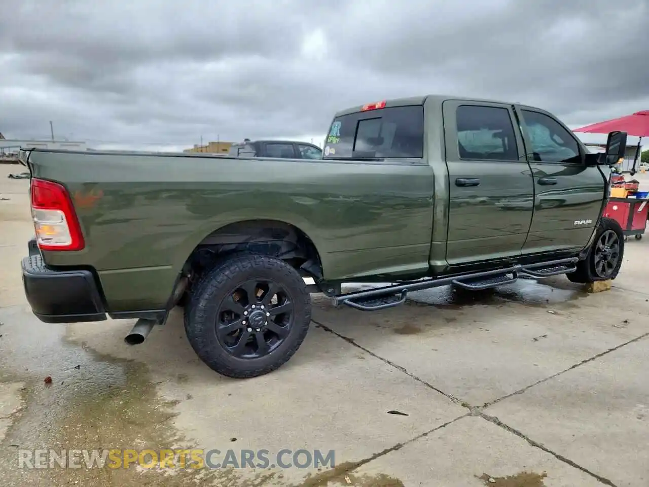 3 Photograph of a damaged car 3C6UR5HLXNG106582 RAM 2500 2022