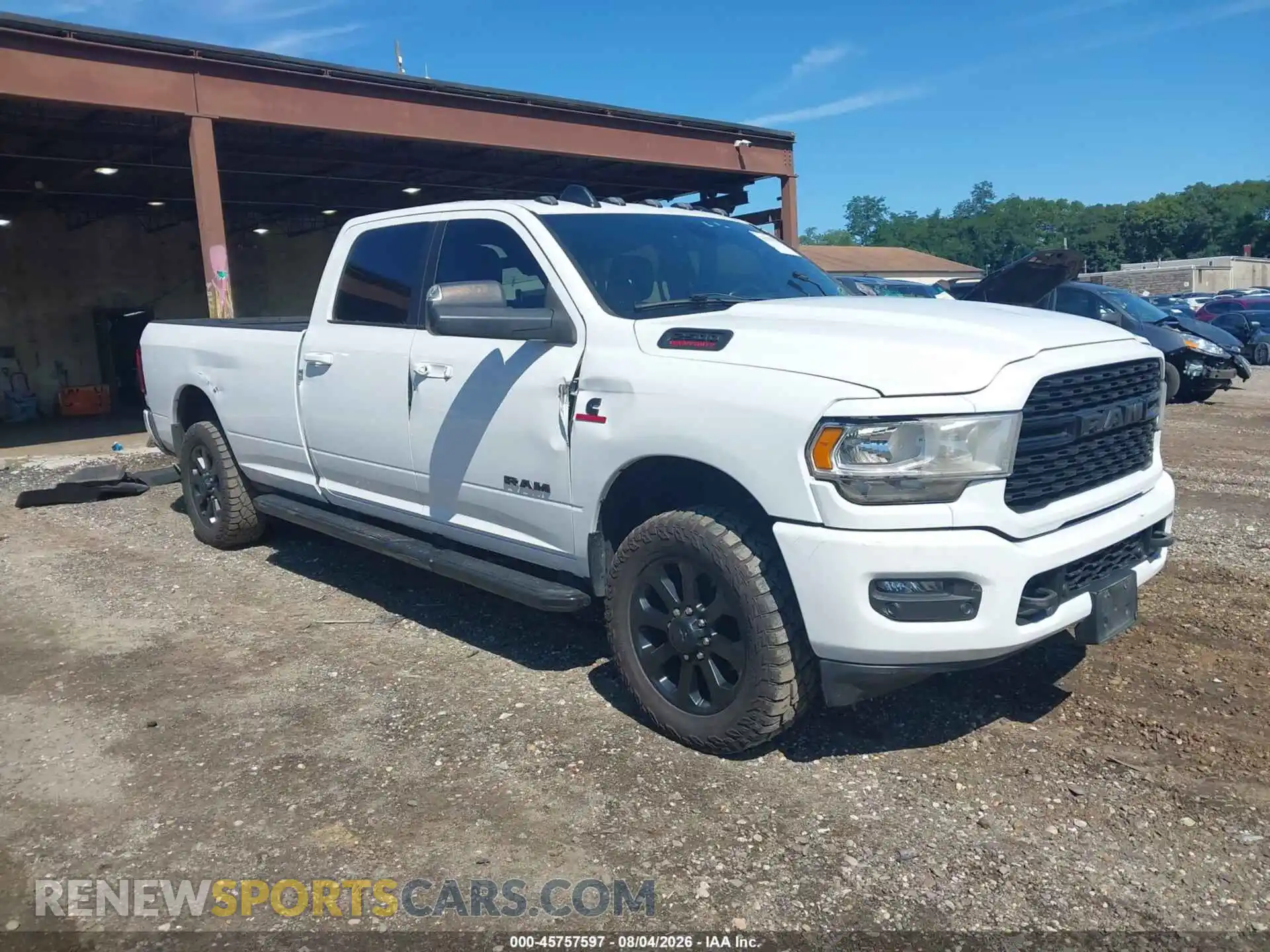 1 Photograph of a damaged car 3C6UR5JL0NG102423 RAM 2500 2022